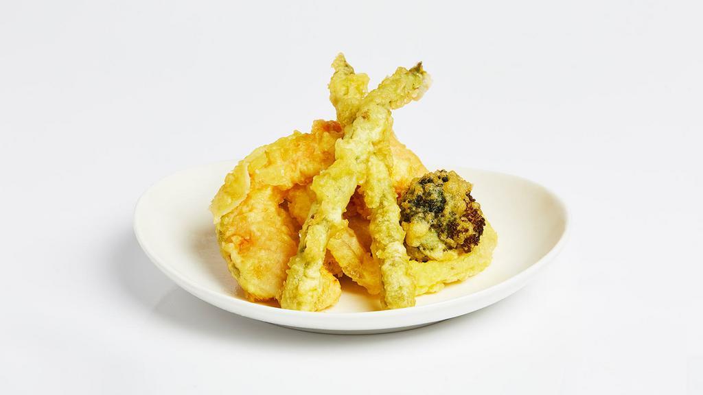 Vegetable Tempura · Vegetables fried in tempura batter and served with a tempura dipping sauce.