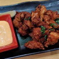 Karaage · Japanese Style Fried Boneless Dark Meat Chicken, Spicy Mayo Dip.
