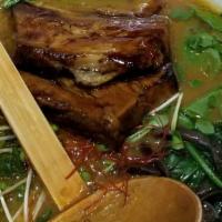 Tonkotsu Shoyu · Pork Broth, Roasted Pork Belly, green cabbage, Kikurage, Menma Bamboo (Lactate Fermented Bam...