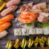 Sushi & Sashimi Omakase · Six Pieces of Sushi, Ten Pieces of Sashimi and One Spicy Tuna Roll.