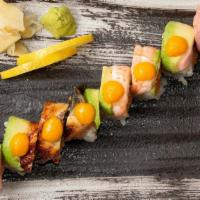 Zen Roll · Spicy Crunchy Salmon, Mango, Topped with Black Pepper Tuna, Shrimp, Eel.