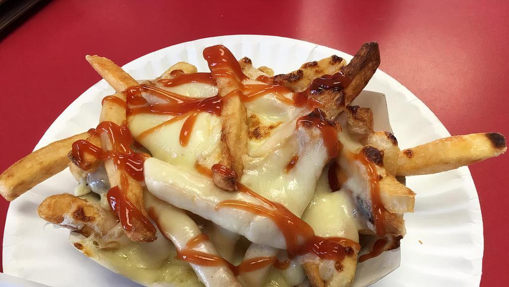 Fries With Cheese & Bacon · French Fries smothered with Bacon & Cheese