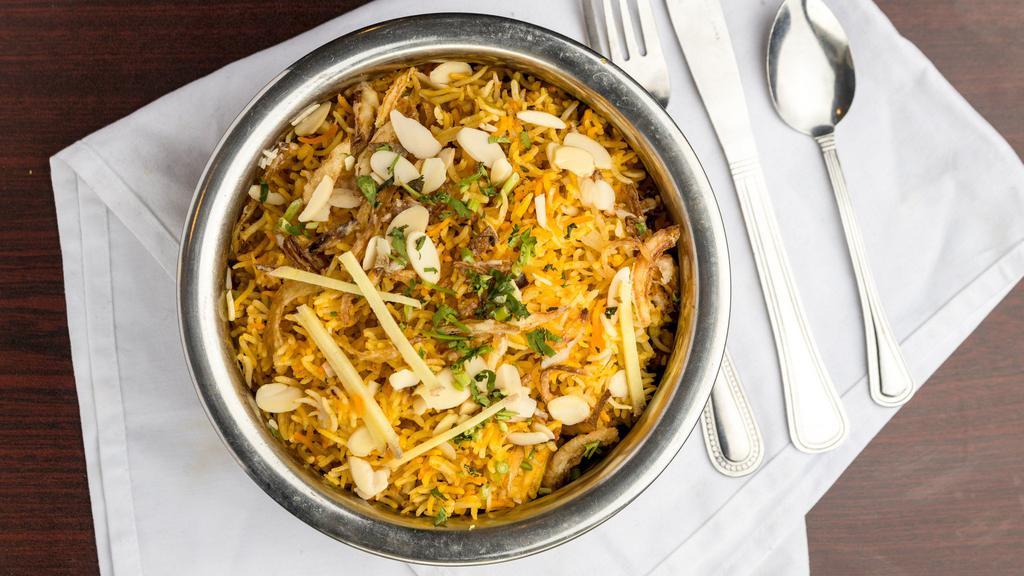 Chicken Biryani · Aromatic basmati rice cooked with chicken & enhanced with traditional Indian spices