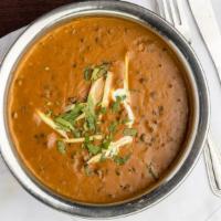 Dal Makhani · A harmonious blend of black lentils, tomatoes, ginger & garlic, simmered till perfection . F...