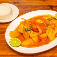 Sudado De Pescado · Steamed fish with onions and tomatoes. Served with white rice.