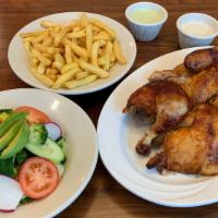 ½ Pollo A La Brasa Con Papas Y Ensalada · ½ roasted chicken with fries and salad.