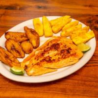 Salmon Grillado · Grilled salmon with two side orders.