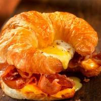 Bacon, Egg & Cheese In A Croissant · Scramble eggs, bacon, cheese in a croissant.