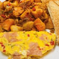 Western Omelette  · 2 scramble eggs, Ham, onion, Pepper, home fries, toast(white or wheat only)