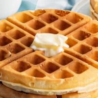 Waffles · Homemade waffles with butter and syrup