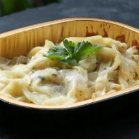 Fettuccine Alfredo · Fettuccine, white alfredo sauce, parsley.