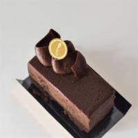70% Chocolate Cake · Chocolate terrine, chocolate & ginger ganache. Gluten free.