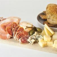 Charcuterie & Cheese Platter · Cured meat & artisanal cheeses, housemade seasonal jam, caperberries, 8 grain bread.