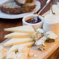 Cheese Platter · Artisanal cheeses, housemade seasonal jam, caperberries, 8 grain bread.