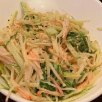 Kani Salad · Kani, cucumber, seaweed salad and masago mix with spicy sauce.