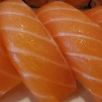 Salmon Lover · Six pieces salmon sushi and salmon roll.