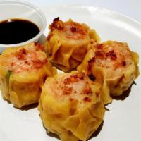 Shrimp Dumpling · Steamed marinated ground shrimp mixed with assorted vegetables in dumpling skin served with ...