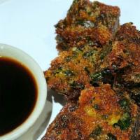 Chives Cake · Deep-fried or Stemed, Thai Style Chives Cake serves with sweet&sour soy sauce.