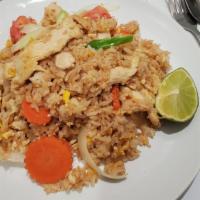 Thai Fried Rice · Sauté steamed rice, fresh garlic, chinese broccoli, carrot, onion, tomato, scallion, egg, br...