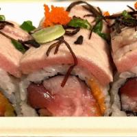 Toro Special Roll · Spicy Tuna, Salmon, Yellow Tail, Avocado Wrapped with Soybean Paper topped w/ Seared Toro, D...