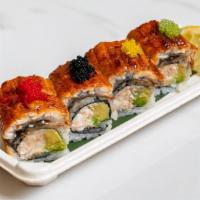 Giant Eel Roll · Crab Meat, Avocado, Topped w / whole pcs Eel, Tobiko & Chef Special Sauce.
