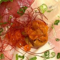 Chirashi Bowl - Entree · 10 Pcs Assorted Sashimi, Uni and Ikura Over Rice, Oshinko and Chef Special Sauce.