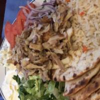 Chicken Gyro Platter · Chicken, house sauce, tzatziki, tomatoes, onions, lettuce, and french fries or rice.
