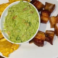 Guacamole Mix · Tostones con chicharron & guacamole.
Fried Green Plantain, pork skin and guacamole.