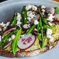 Avocado Smash · Spring peas, radish, feta, sesame crumble on toasted sourdough