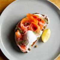 Smoked Salmon Lox Toast · dill cream cheese, pickled onions, capers, poached egg, lemon, on sourdough