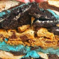 Cookie Monster Overload · Oreo bagel with cookie monster cream cheese, Oreos, and chocolate chip cookies.