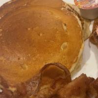 Pancakes With Canadian Bacon · Flat sweet cake.
