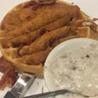 Southern Chicken And Waffle · Fried chicken, chopped bacon, topped with homemade sausage gravy.