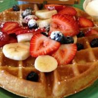 Belgian Waffles With Fruit Topping · Served with topping.
