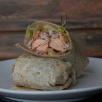 Grilled Salmon Wrap · Includes lettuce, tomatoes, onion, and special sauce.