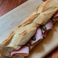 Jambon Beurre · French ham, pickles butter on the baguette.