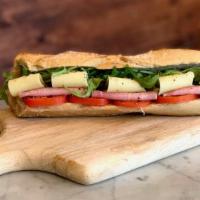Parisien · Pickles butter on the baguette tomato, French ham, swiss cheese, arugula.