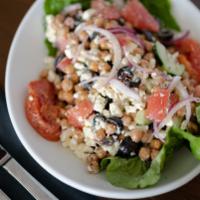 Chickpea Mediterranean Salad · Roasted chickpeas, tomato, red onions, peppers, black olives, and feta cheese drizzled in a ...
