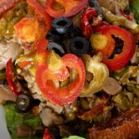 Cherry Pepper Salad · Cherry peppers with black olives, red onions, sliced mushrooms, and celery, marinated in oli...