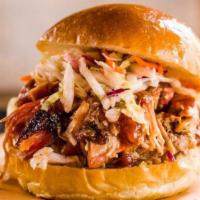 Pulled Pork · Hand-pulled, slow-smoked pork shoulder glazed with our house-made BBQ Sauce. Served with an ...