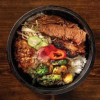 Rice Bowl · Jasmine Rice topped with your choice of 2 sides.  Add protein for an additional fee.