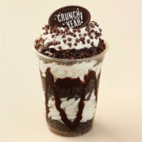 Crunch  Sundashes · Layers of chocolate crunchies,  vanilla  cream and fudge topped with whipped cream and fudge...