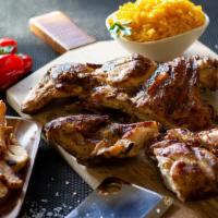 Chicken (Whole) · Barbequed chicken with a side of fries, rice, and garnishes. Substitute fries for beans or s...