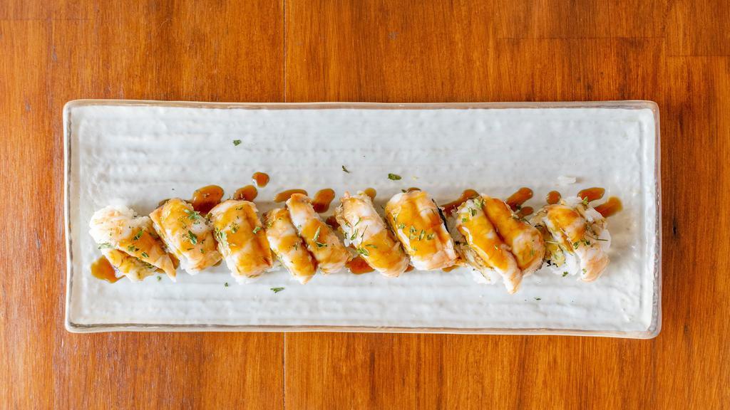 Dancing Shrimp · Shrimp tempura roll with shrimp.