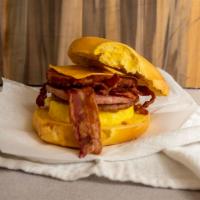 Bordentown Bagel Buster · Scrambled Eggs, Cheese, Bacon, Sausage, Pork roll, and a hash brown, all on a bagel of your ...