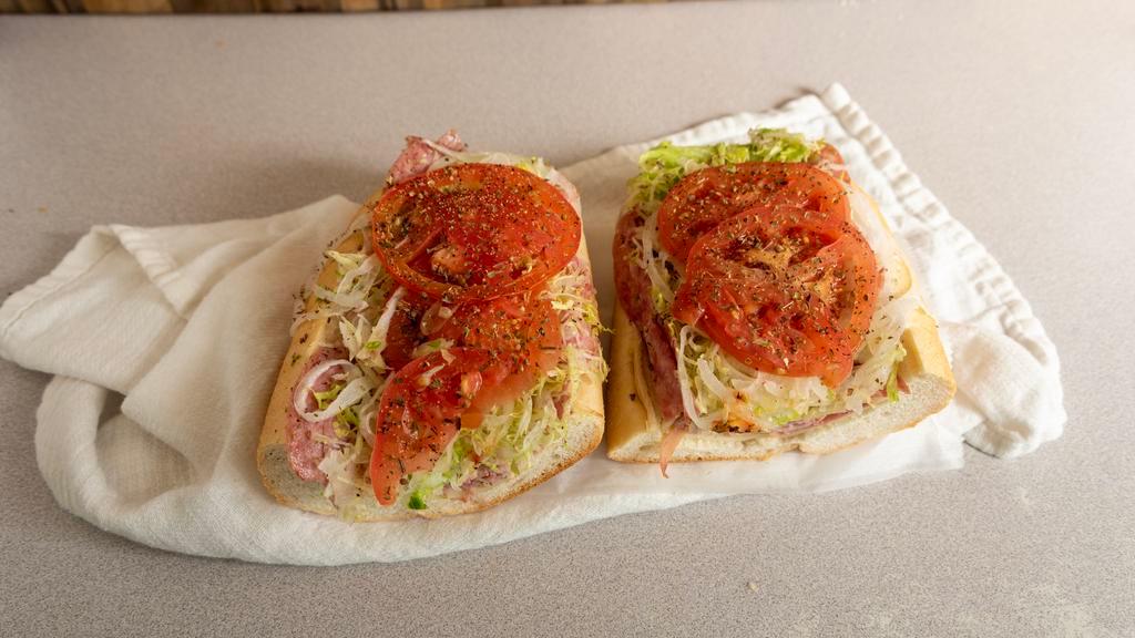 Italian Hoagie · Ham, capicola, and provolone cheese on a torpedo roll. Does not come with toppings- add lettuce, tomato, onions, or any other toppings of your preference.