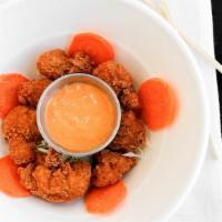 Chicken Karaage Donburi · Japanese styled chicken with white rice, spicy mayo, carrot, cabbage, green spicy mayo dippi...