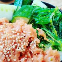 Spicy Tuna Bowl  · ground yellowfin tuna with spicy mayo, white rice, cucumbers, seaweed salad, and sesame seeds
