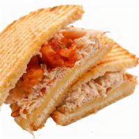 Turkey Club Panini · Our delicious panini bread toasted to perfection and made with cheese, turkey and crisped ba...