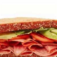 Whole Italian Giant Deli Sandwich · Our Italian Giant Deli sandwich features freshly sliced premium salami and capicola piled hi...